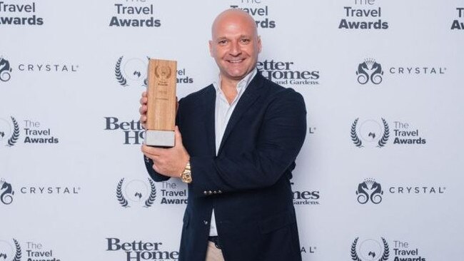 Excite Holidays co-founder George Papaioannou accepting Travel Weekly’s Wholesaler Of The Year Award. Picture: Facebook.