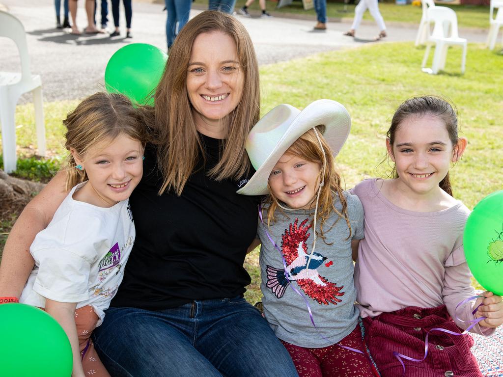 Abby (left), Hailey and Sacha Holmes with Levina Ciccarelli. Meatstock Festival, Toowoomba showgrounds. April 2022