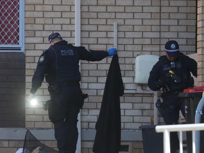 police search the area around unit 17 -63 Charles street Liverpool after reports of a shot fired. Picture: John Grainger