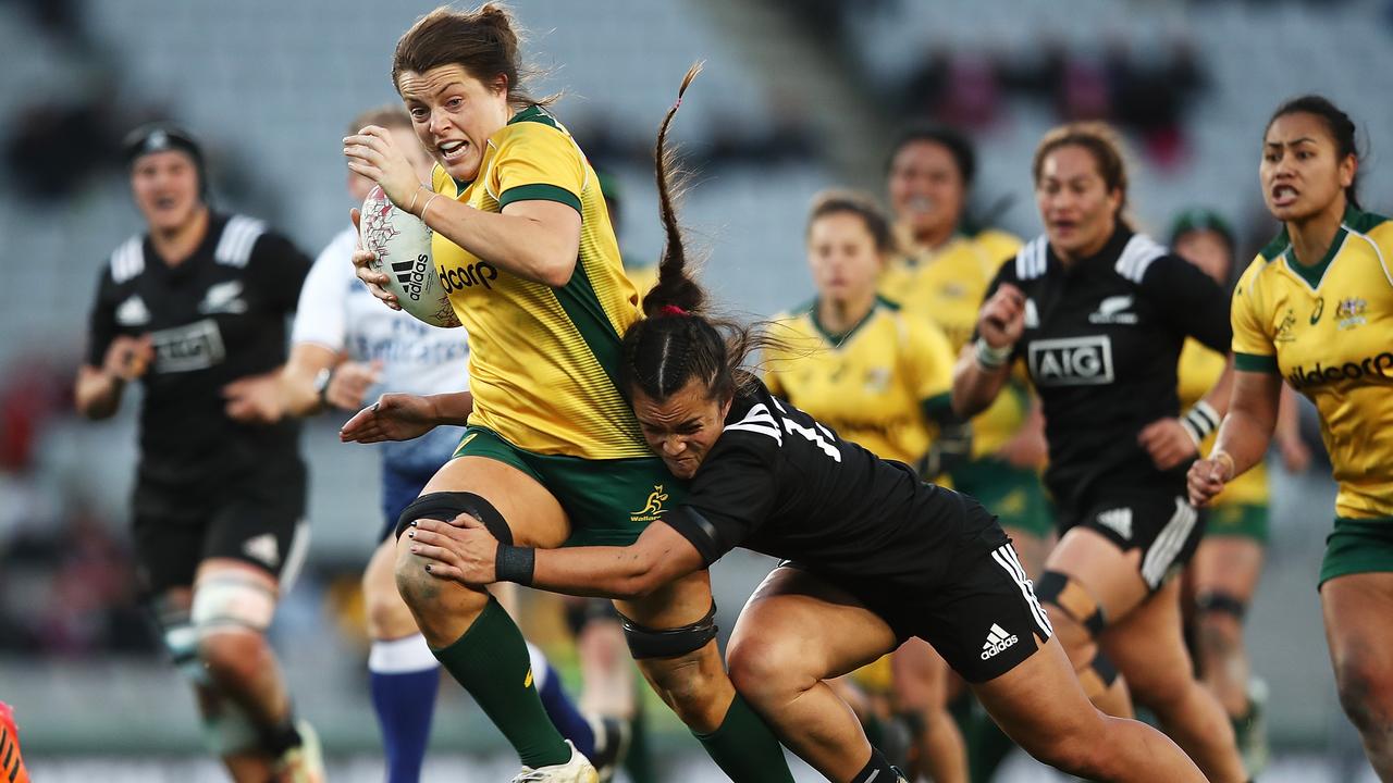 Grace Hamilton of the Wallaroos makes a break.