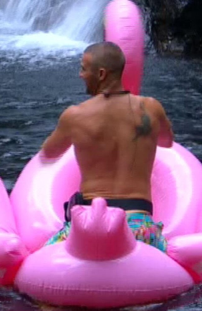 Kris Smith rides an inflatable swan during filming of I'm a Celebrity. Get Me Out Of Here! Picture: Karina Jurisic