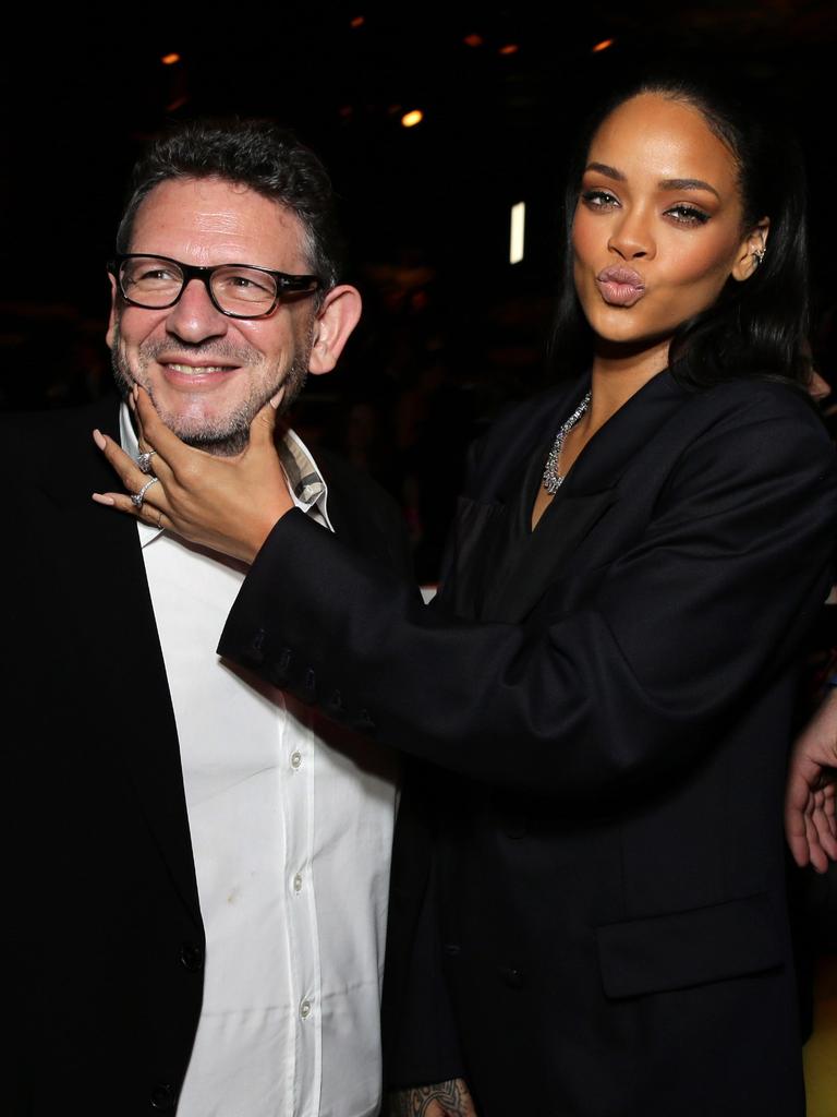 Lucian Grainge and Rihanna attend the 57th Annual Grammy Awards Universal Music Group After Party. Picture: Splash