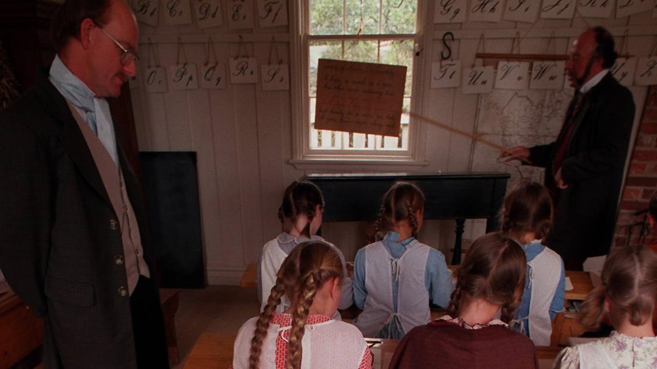 Dec96. New school to open at Soveriign Hill. Remember when girls wore plaits a classroom scene in the National School at Sovereign Hill.  /education