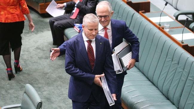 Prime Minister Malcolm Turnbull walked into the chamber for Question Time with the new Nationals Leader Michael McCormack. Picture: Gary Ramage.