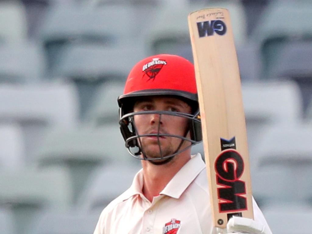 Travis Head of South Australia raises his bat on reaching a half century during day 2 of the Round 8 Sheffield Shield cricket match between Western Australia and South Australia at the WACA in Perth, Monday, March 4, 2019. (AAP Image/Richard Wainwright) NO ARCHIVING, EDITORIAL USE ONLY, IMAGES TO BE USED FOR NEWS REPORTING PURPOSES ONLY, NO COMMERCIAL USE WHATSOEVER, NO USE IN BOOKS WITHOUT PRIOR WRITTEN CONSENT FROM AAP