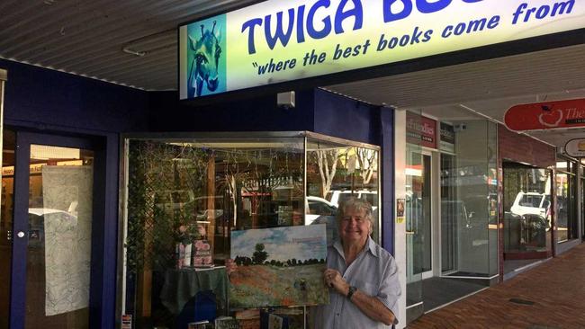 STANDING TALL: Roger Broadley presents Gympie's new book store, opening tomorrow - the one with the unusual name. Picture: Arthur Gorrie