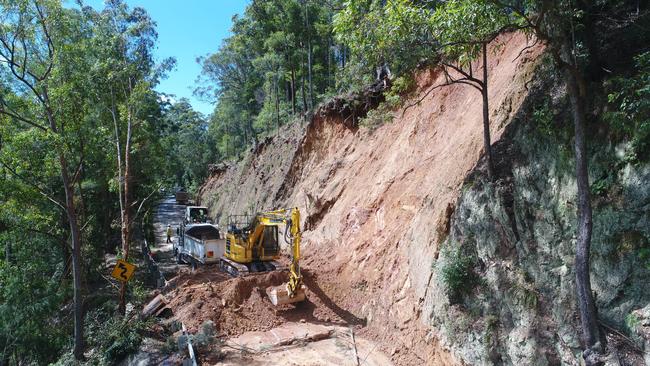 Crews worked to open Waterfall Way again.