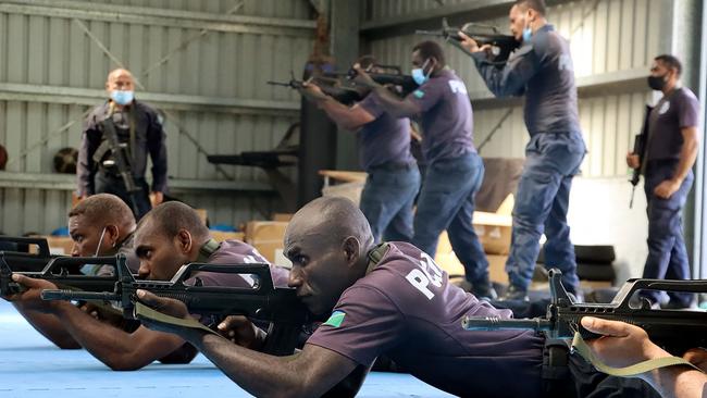 The Royal Solomon Islands Police Force (RSIPF) shows China Police Liaison Team officers training in drill, unarmed combat skills, and crowd control. Picture: AFP/Royal Solomon Islands Police Force