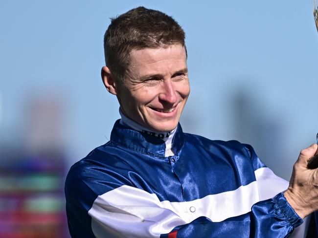 James McDonald celebrates winning the Champions Stakes at Flemington. Picture: Morgan Hancock-Racing Photos