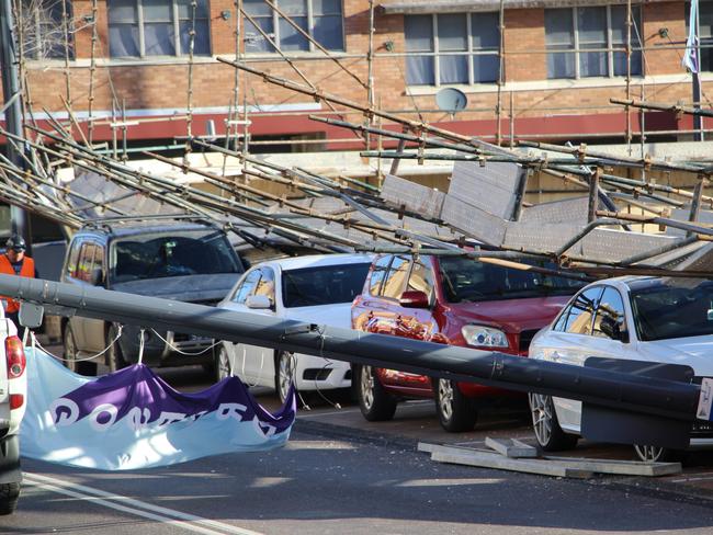 During demolition works, there was a scaffolding accident which saw eight cars and a ute partially crushed. Picture: Fiona Killman