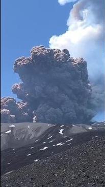 Italy's Mount Etna erupts sending plumes of smoke rising to the sky
