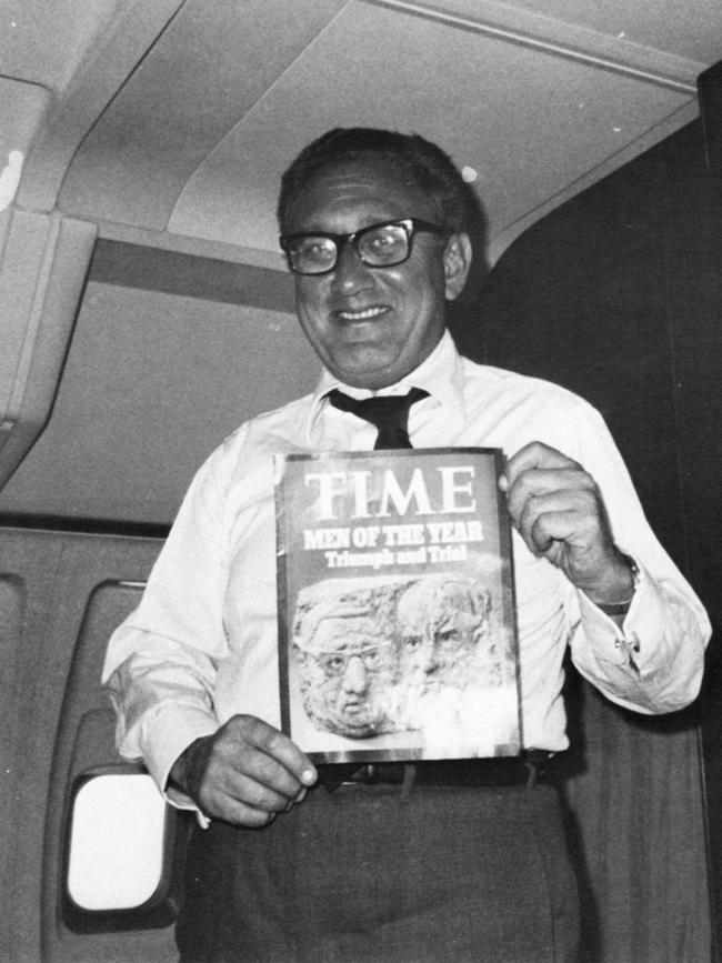 Kissinger on Air Force One in 1972, after Time magzine named him and Richard Nixon Men of the Year.