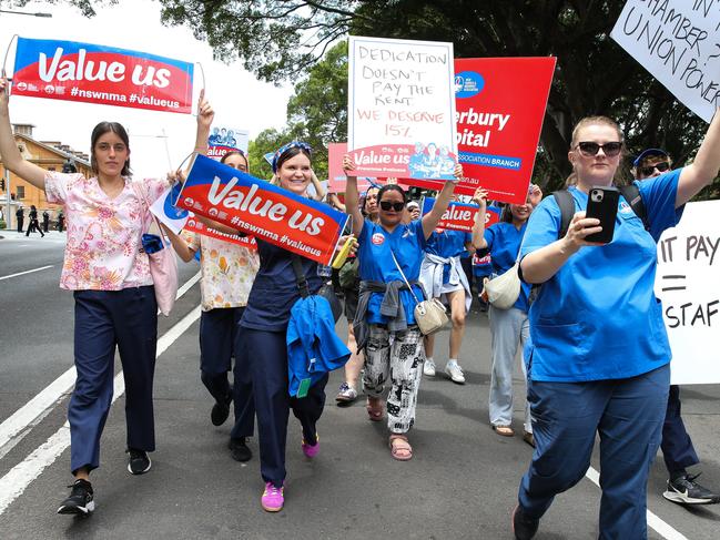 SYDNEY, AUSTRALIA : NewsWire Photos - NOVEMBER 13 2024; Nurses and midwives hold a 24-hour statewide strike, as frontline workers rally today. They march from Hyde Park down Elizabeth street to outside Parliament House in Sydney, with demands for fair wages, while patients across NSW will be left waiting. Picture: NewsWire / Gaye Gerard