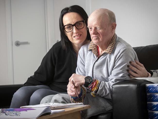 Jo Lang, the house manager of an Able Australia property at Kingston, with resident Paul Castles. Picture: Chris Kidd