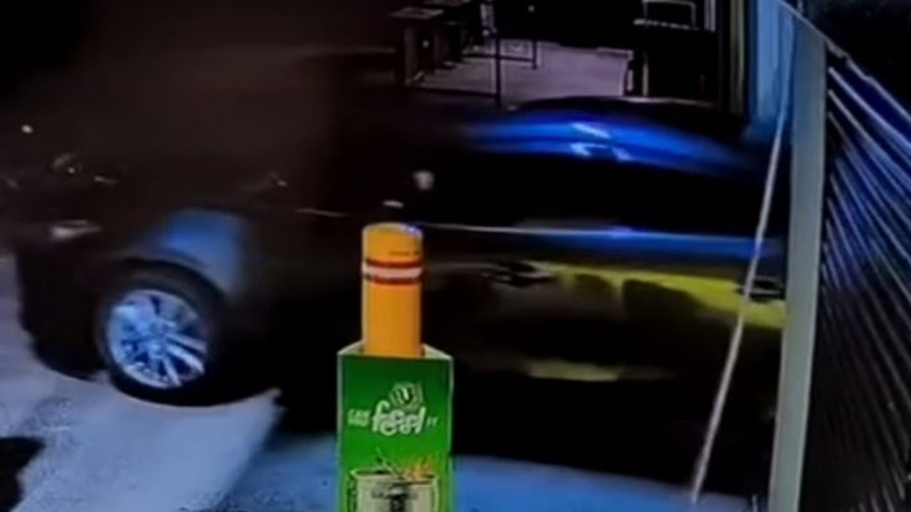 A still from CCTV shows a car ramming through the front entrance of the shop in January 2024.