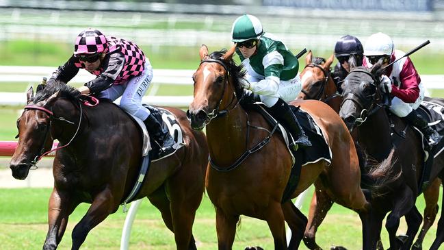 Two-year-old filly Sunrays (right) maintains her unbeaten record with an impressive win at Doomben. Picture: Grant Peters/Trackside Photography