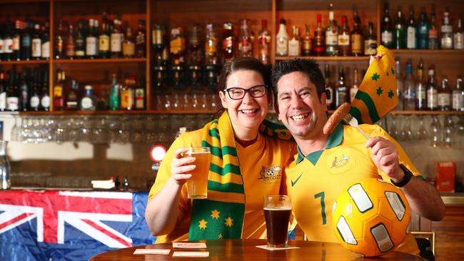 Jane Hoffman and Justin Neave getting into the spirit of the World Cup at the Hotel Metropolitan, Adelaide. Picture: Tait Schmaal