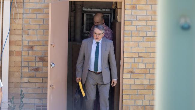 Russian ambassador to Australia Aleksey Pavlovsky is snuck out a back door of the Russian Embassy in Canberra on Friday. Picture: Liam Mendes