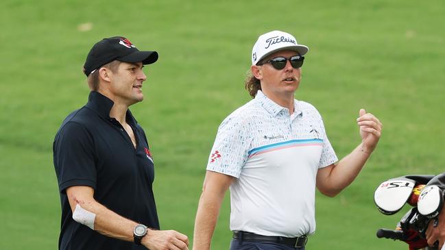 Cameron Smith and Richie McCaw played together in the pro-am. (Photo by Mark Metcalfe/Getty Images)