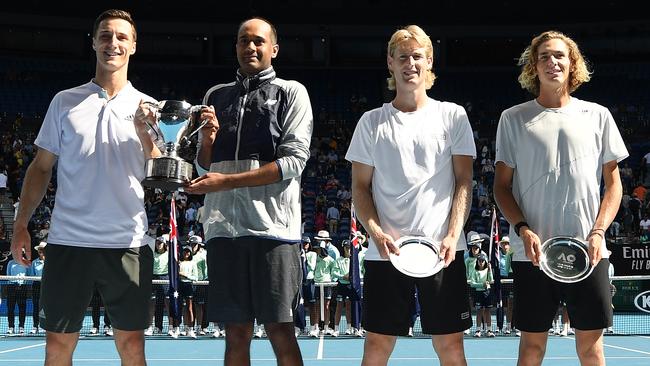 Rajeev Ram and Joe Salisbury with the doubles trophy, and Australians Max Purcell and Luke Saville. Picture: Getty Images