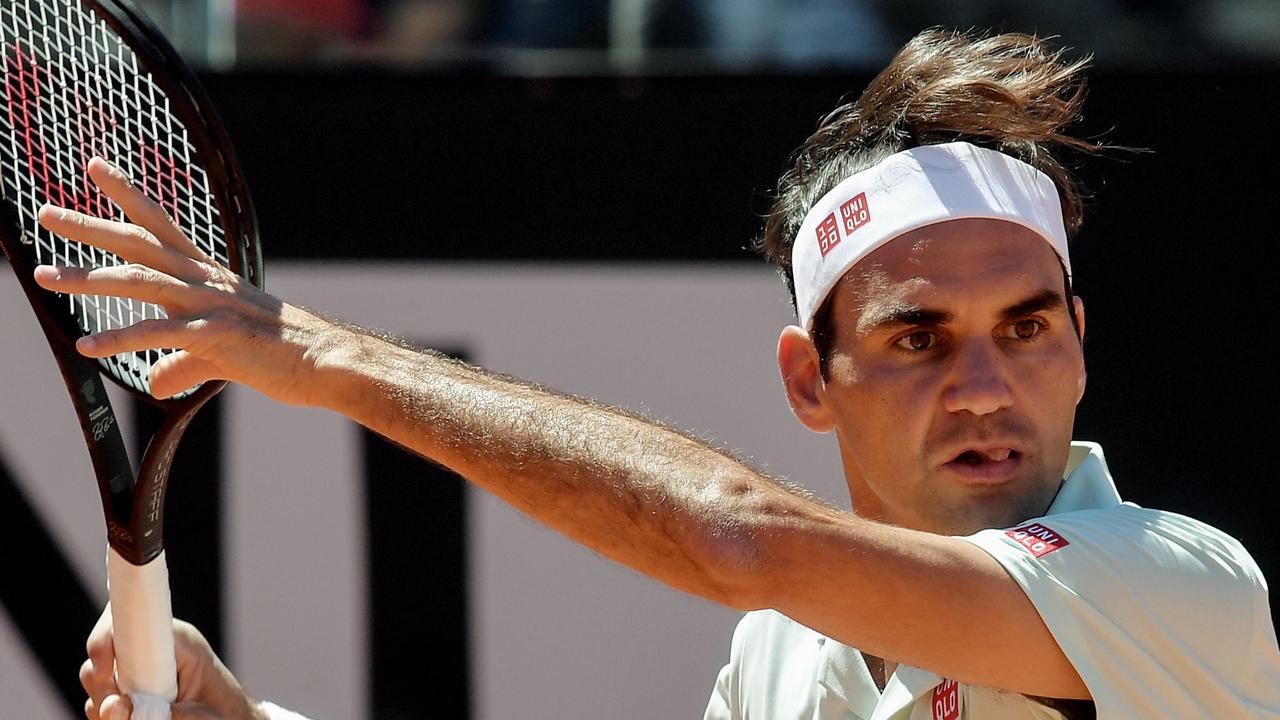 Switzerland's Roger Federer returns the ball to Portugal's Joao Sousa.