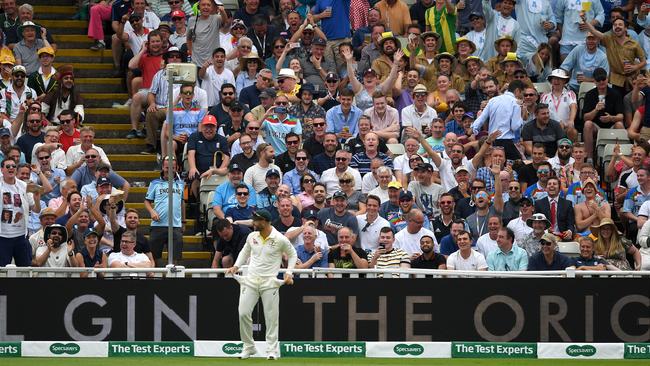David Warner shows the Barmy Army exactly what he does have in his pockets. Picture: Getty Images