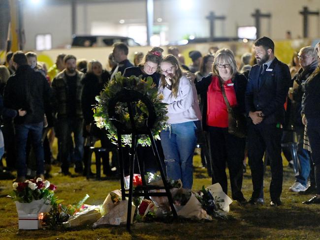 Members of the local community attend an evening vigil after the crash for those that lost their lives. Picture: NCA NewsWire/ Jeremy Piper