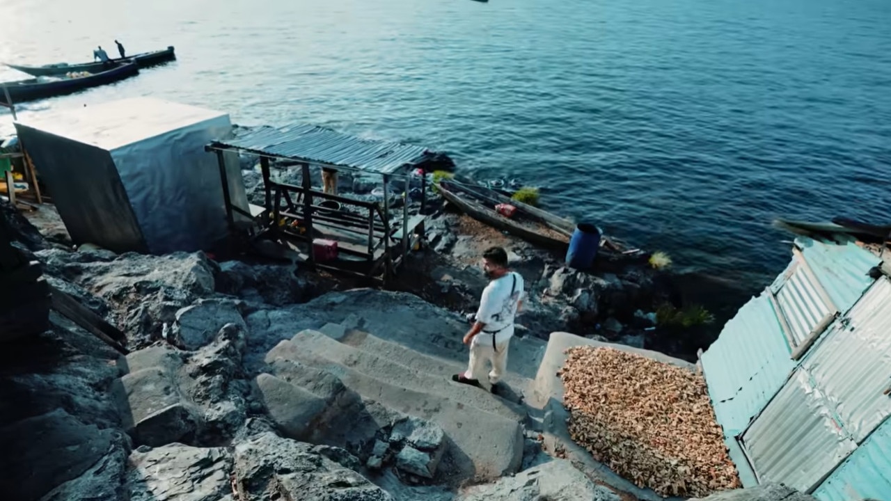 Joe waiting for the fisherman to return with the day’s catch.