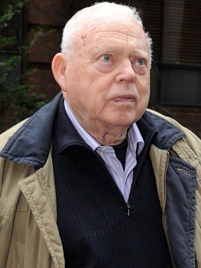 Car racing legend Bob Jane leaves the Supreme Court of Appeal in Melbourne in 2013. Picture: AAP Image/Julian Smith.