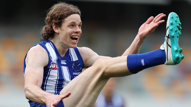 AFL Round 8. 25/07/2020. North Melbourne vs Carlton at the Gabba, Brisbane. Ben Brown of the Kangaroos kicks a 1st qtr goal. Pic: Michael Klein