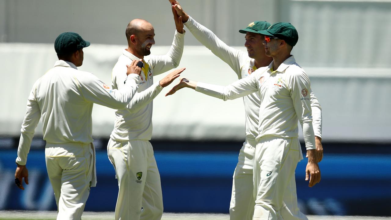 Nathan Lyon and Peter Handscomb of Australia celebrate (Photo by Ryan Pierse/Getty Images)