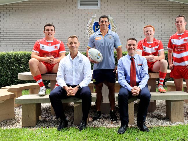 3rd November 2020, Palm Beach Currumbin High School, Gold Coast Titans announce a formal partnership with PBC High School. L-R, PBC Students Jack Cullen, Oscar Bryant and Tom Weaver with Gold Coast Titans CEO Steve Mitchell, Titans player Jamal Fogarty and PBC principal Chris Capra. Photo: Scott Powick