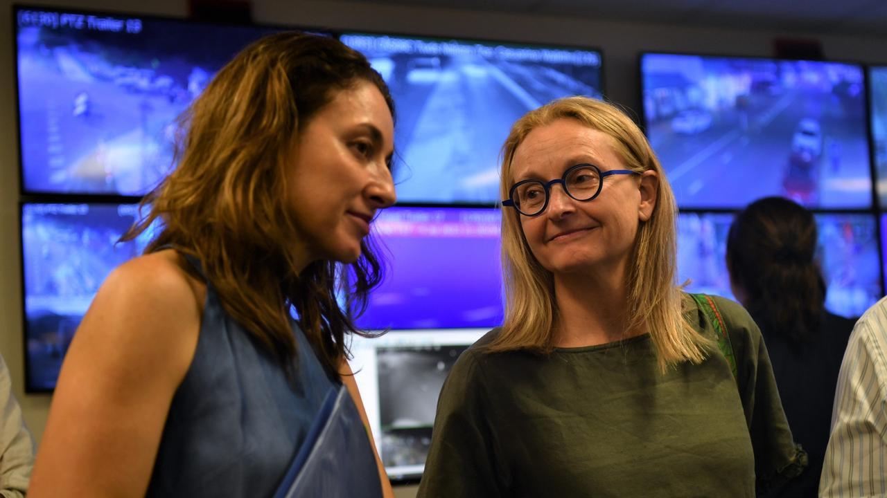 NT coroner Elisabeth Armitage and her counsel assisting Peggy Dwyer tour the Joint Emergency Services Communication Centre (JESCC) to see how triple-0 calls are taken and dispatched to police.