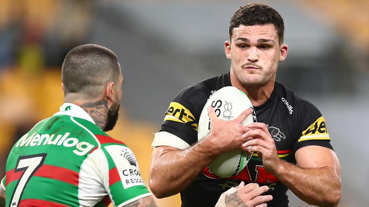 BRISBANE, AUSTRALIA - AUGUST 20: Nathan Cleary of the Panthers is tackled by Adam Reynolds of the Rabbitohs during the round 23 NRL match between the Penrith Panthers and the South Sydney Rabbitohs at Suncorp Stadium, on August 20, 2021, in Brisbane, Australia. (Photo by Chris Hyde/Getty Images)