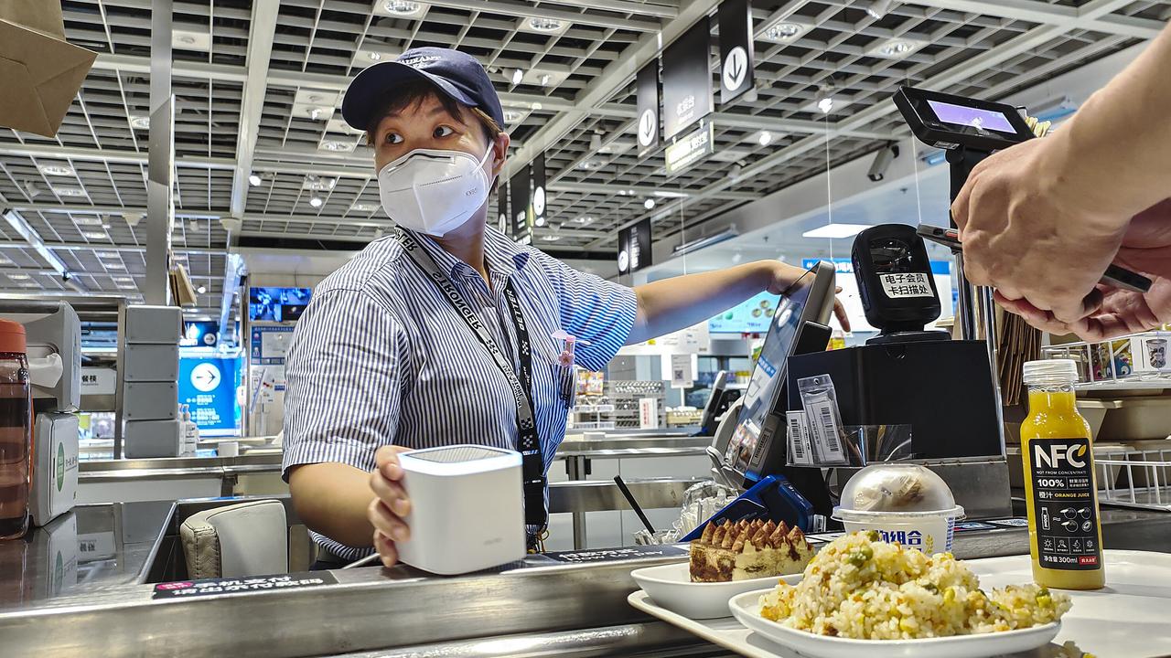 A worker at the Ikea restaurant in Wuhan, Hubei Province, China. Picture: Getty Images