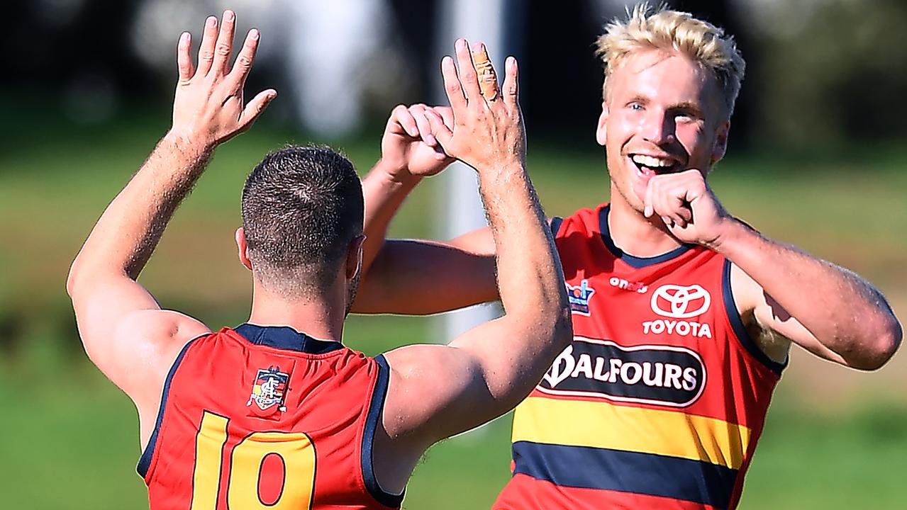 Billy Frampton of the Crows celebrates a goal with Matthew Wright of the Crows during the  SANFL game between Central District and Adelaide at Elizabeth Oval.Saturday April,24,2021.Picture Mark Brake