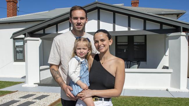 Kellie and Jeremy Finlayson with their daughter Sophia, 3. Picture Mark Brake