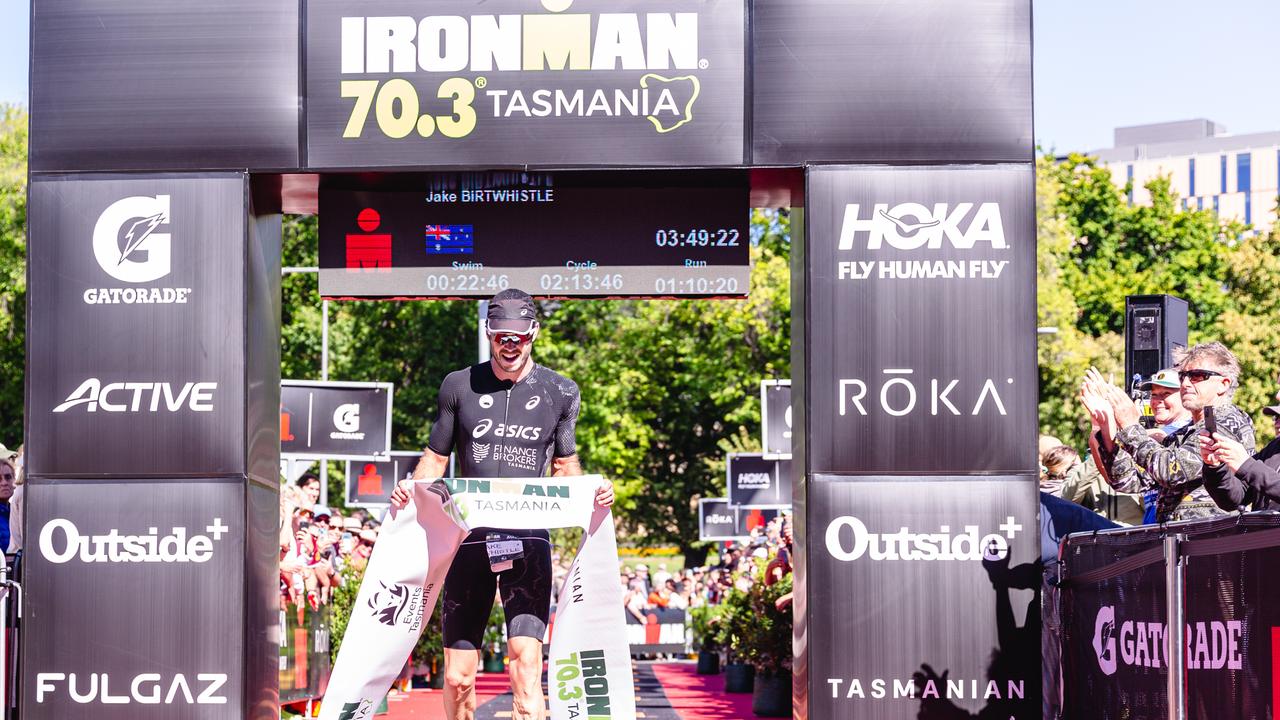 Jake Birtwhistle cross the finish line of the inaugural Ironman 70.3 Tasmania. Picture: Linda Higginson