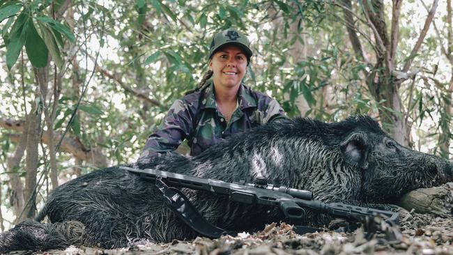 Nat Folpp from Boaring Australia with one of her boars.