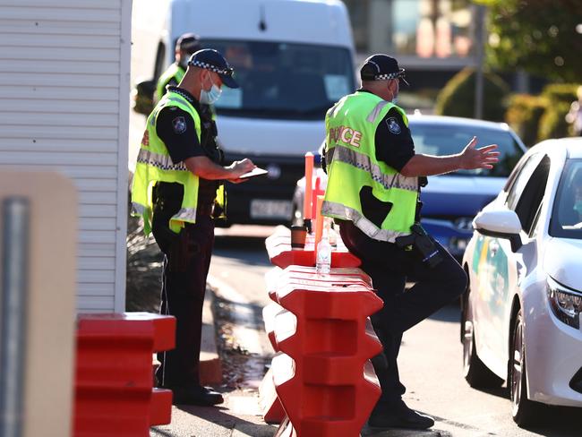 Police are patrolling Coolangatta at the Queensland border to prevent people travelling into the state from NSW. Picture: Chris Hyde/Getty Images