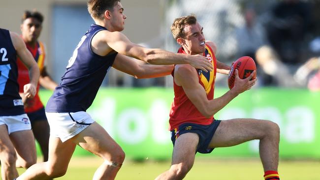 TOP PROSPECT: SA draft prospect Luke Edwards tries to evade Vic Metro’s Daniel Mott during last year’s AFL under-18 championships. Picture: MARK BRAKE (AFL Photos/via Getty Images).