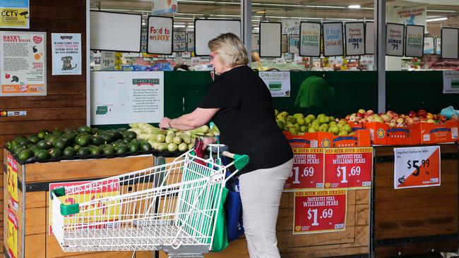 SYDNEY, AUSTRALIA -  Newswire Photos MARCH 14 2023 - A member of the public is seen buying produce and groceries in Sydney as the Cost of living continues to rise. Picture: NCA Newswire / Gaye Gerard.