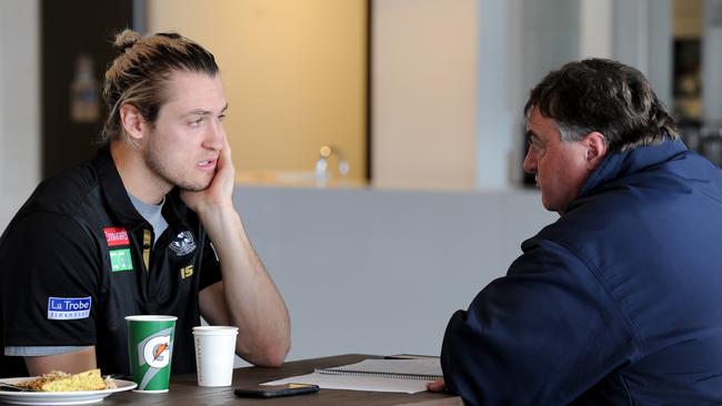 Collingwood's Darcy Moore chats with Herald Sun columnist and Magpies premiership player Mick McGuane. Picture: Andrew Henshaw