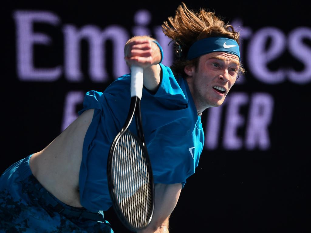 Russia's Andrey Rublev serves against Norway's Casper Ruud at this year’s Australian Open. (Photo by William WEST / AFP)