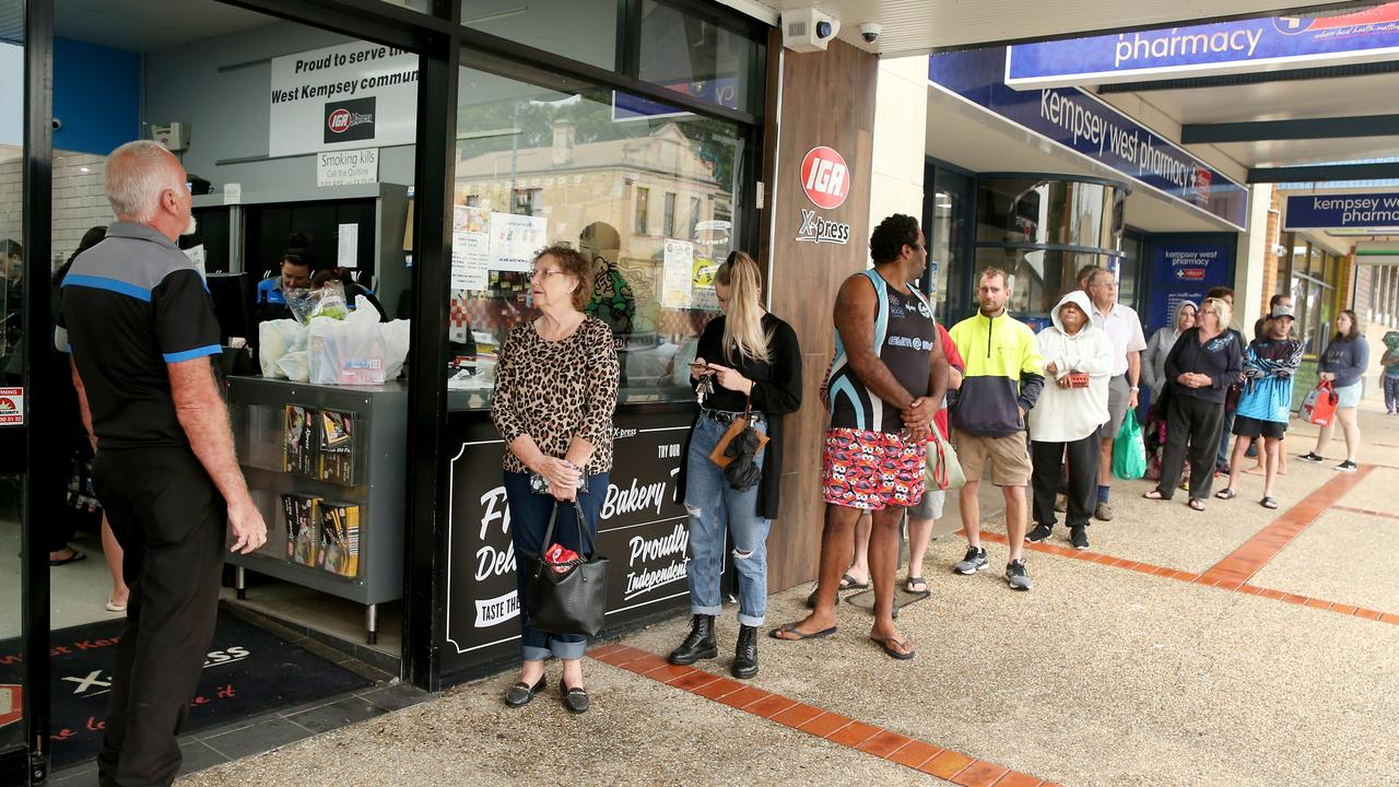 Heavy rain continues to batter the NSW mid north coast causing major flooding. Kempsey residents line up at the IGA for supplies at the only supermarket left open . Nathan Edwards