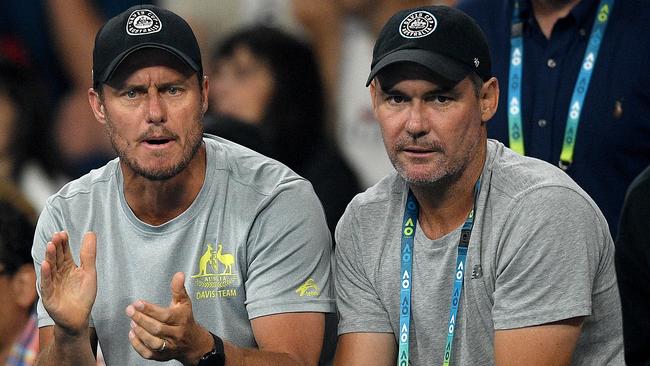 Lleyton Hewitt (left) watches on during the third-round match between Nick Kyrgios and Karen Kachanov. Picture: AAP