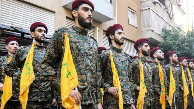 Hezbollah fighters in September. Decimated militarily and waning politically, opposition parties have sensed a chance for societal change.