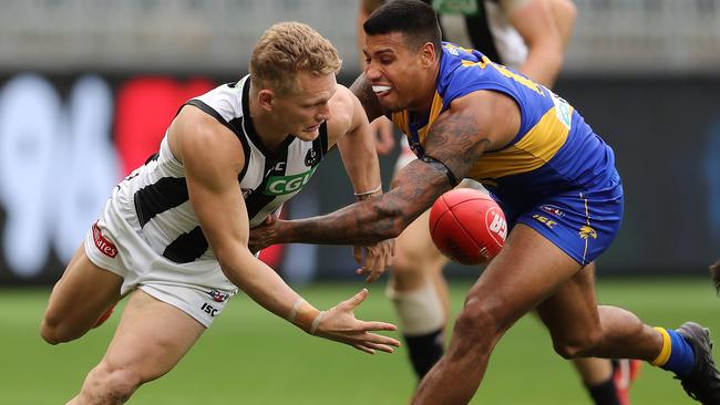 Collingwood star Adam Treloar will go head-to-head with Eagles gun Tim Kelly on Sunday. Picture: Paul Kane/Getty Images