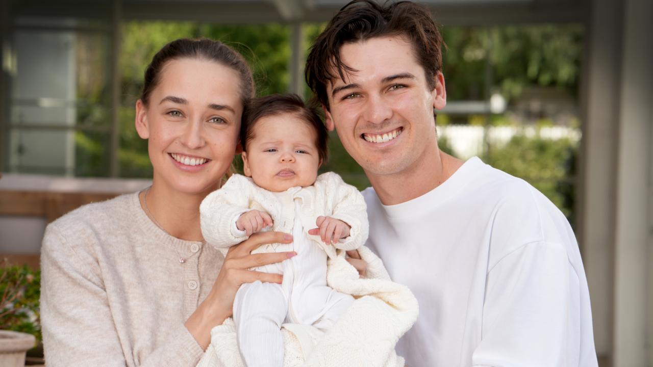 Connor Rozee, his fiance Maisie and daughter Audrey. Picture: Dean Martin.