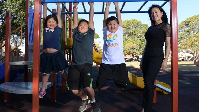 Mother of three Amy Chieng brings her children to the park regularly and would like to see shade protection installed at all parks in the area. Picture: Simon Bullard.